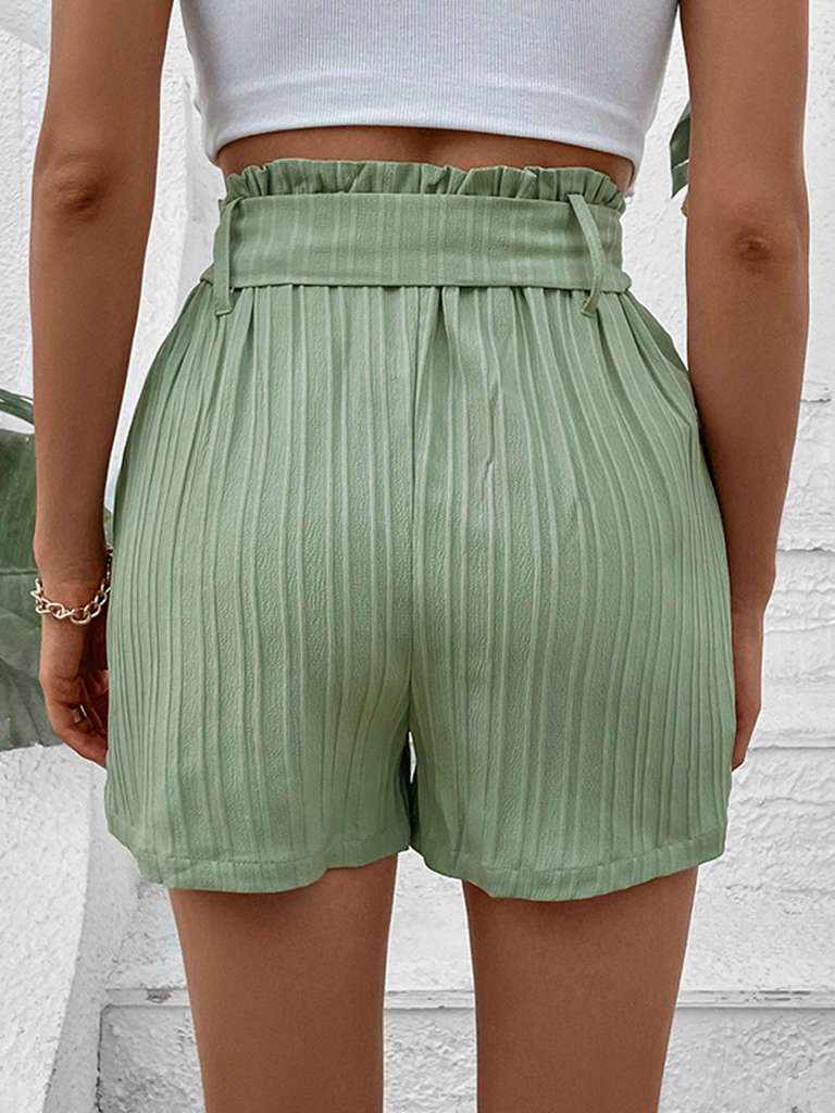 Small fresh green solid color pleated shorts
