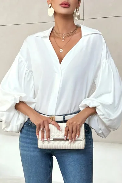 Long-fitting, puff-sleeved top with a semi-open collar