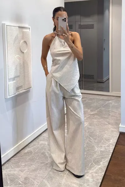 One-shoulder strap irregular striped top and trousers two-piece set
