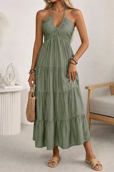 Solid color halter neck vacation style loose long dress fashionable backless slingback dress